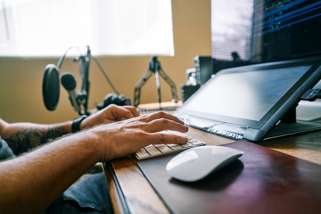writer at desk typing